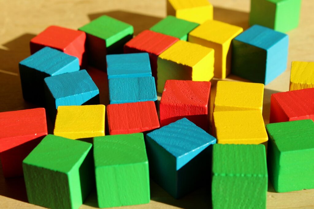 Simple wooden blocks teach building and coordination skills